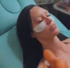 Woman using Hydrate n' Glow Collagen Mask